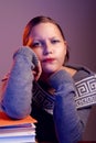 Teen girl sitting at table Royalty Free Stock Photo