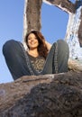 Teen Girl sitting in Urban Ruins