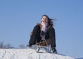 Teen girl sledding Royalty Free Stock Photo