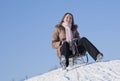 Teen girl sledding Royalty Free Stock Photo