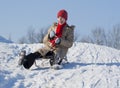 Teen girl sledding Royalty Free Stock Photo