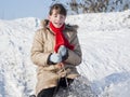 Teen girl sledding Royalty Free Stock Photo