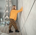 Teen girl standing in her room on Christmas eve Royalty Free Stock Photo