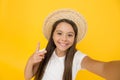 Teen girl summer fashion. Little beauty in straw hat. Beach style for kids. Visit tropical islands. Turn back brim straw