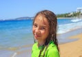 Teen girl surfing on tropical beach. Child on surf board on ocean wave. Active water sports for Teenager