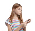 Teen girl using glucometer on white background.