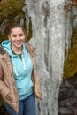 Teen girl standing by frozen waterfall - Governor Dodge State Park - Wisconsin