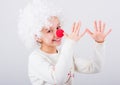 Teen girl in white clown wig gesturing with hands Royalty Free Stock Photo