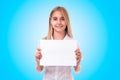 Teen girl in white shirt holding advertising sign board. ,isolated