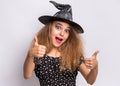 Teen girl in witch black hat