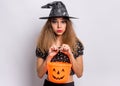 Teen girl in witch black hat Royalty Free Stock Photo