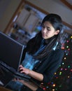 Teen girl working on laptop Royalty Free Stock Photo