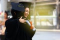 Teen girls couple in graduation gown pride hugging together on graduation day