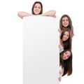 Teen girls holding blanc billboard