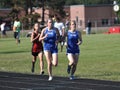 Teen Girls in Long Distance Track Race