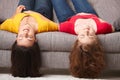 Teen girls resting on couch