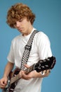 Teen guitar player Royalty Free Stock Photo