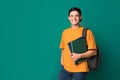 Teen guy with books and backpack over background Royalty Free Stock Photo