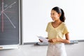 Teen hispanic girl high school student giving a presentation. Happy and smiling.copy space Royalty Free Stock Photo