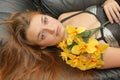 Teen holding a flowers