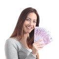 Teen holding a lot of five hundred euro banknotes