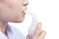 Teen inhales with mouthpiece of jet nebulizer Royalty Free Stock Photo