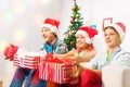Teen kids with presents on New year eve party Royalty Free Stock Photo