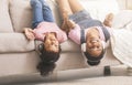 Teen and little black girls enjoying music in headphones