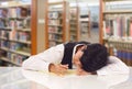 Teen Mixed Race Student Stressed and Frustrated In Library Royalty Free Stock Photo