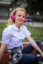 Teen Music And Happy Mood. Adolescent Music In Headphones. Cheerful Happy Girl Outdoor.