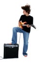 Teen playing electric guitar Royalty Free Stock Photo