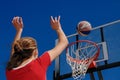 Teen plays basketball