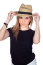 Teen rebellious girl with a straw cap Royalty Free Stock Photo