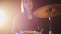 Teen rock music - attractive girl percussion drummer perform music break down