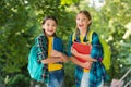 Teen schoolgirls doing homework. Children using copybooks to study. Education and distance learning for kids Royalty Free Stock Photo