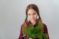 Teen showing herbs. healthy food, vegetarianism