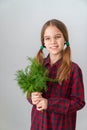 Teen showing herbs. healthy food, vegetarianism