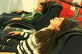 Teen siblings brother and sister in massage chair