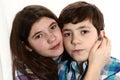 Teen siblings younger brothe and elder sister hug