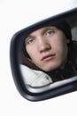 Teen in side view mirror. Royalty Free Stock Photo