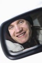 Teen in side view mirror. Royalty Free Stock Photo