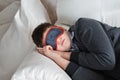 Teen sleeps during the day in mask for sleep Royalty Free Stock Photo