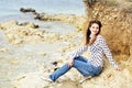 Teen smiling girl on the sea coast Royalty Free Stock Photo