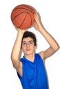 Teen sportsman playing basketball Royalty Free Stock Photo