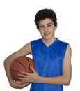 Teen sportsman playing basketball