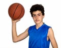 Teen sportsman playing basketball