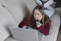 Teen student doing online school work from home