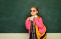 Teen student. Funny school girl wearing eyeglasses, child studio portrait. Education concept. Young teenager schoolgirl Royalty Free Stock Photo