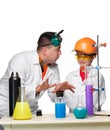 Teen and teacher of chemistry at lesson making