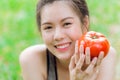 Teen with Tomato smile happy good healthy skin